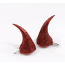 Pair of clip-on red glitter devil horns – fun costume accessory for Halloween or themed parties